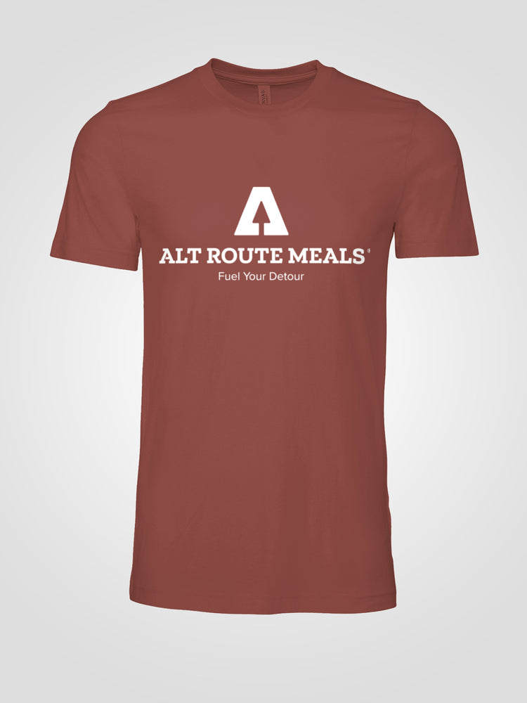 Photo of the Alt Route Meals logo T shirt. Clay colored. Has company logo, and name on front. Company tagline on back of shirt.