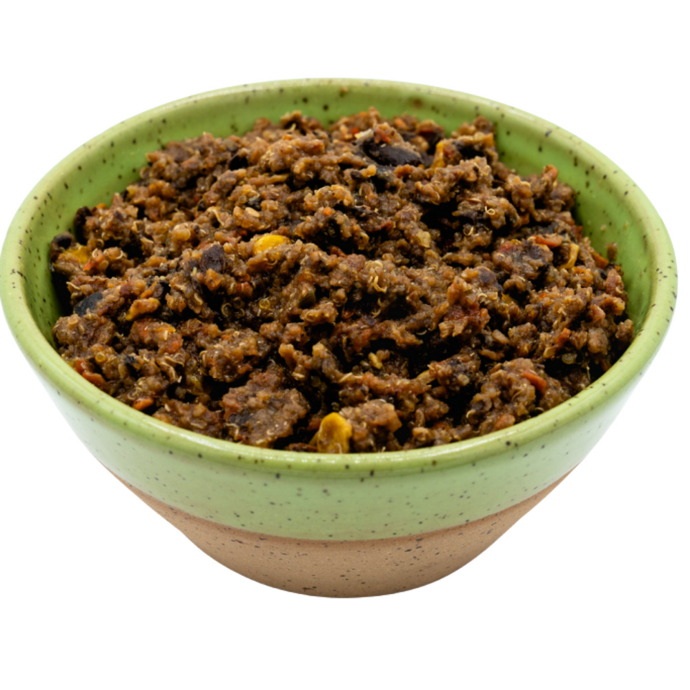 
                  
                    Photo of Alt Route Meals Quinoa Mountain Chili dinner rehydrated and in a ceramic two-toned bowl, green on top, tan clay on the bottom. Against a white stock background.
                  
                